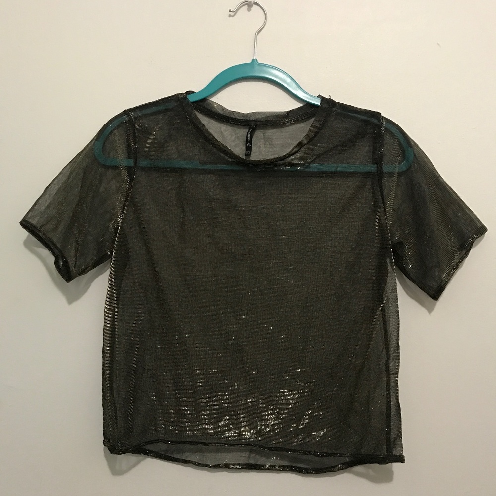 Goldish mesh t-shirt.